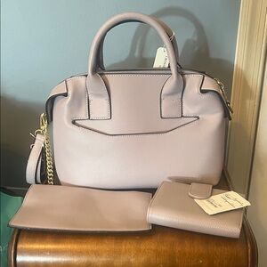 New with Tags Elegant Lavender Handbag Set with wallet, clutch, cross body.
